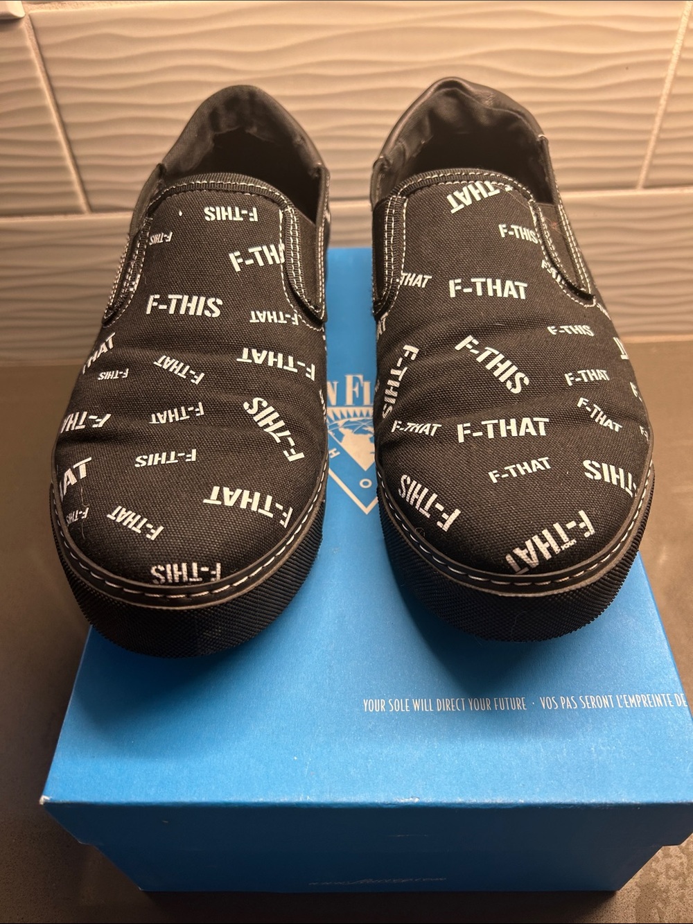 John Fluevog Black Slip-On Loafers with White Text Print